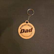 Load image into Gallery viewer, Round Wooden &#39;Worlds Best&#39; Keychains
